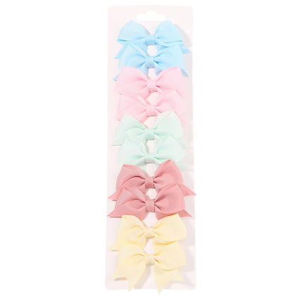 Girls’ bow hair clip set -Set de pinzas con lazo para niñas