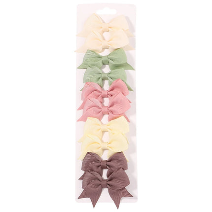 Girls’ bow hair clip set -Set de pinzas con lazo para niñas