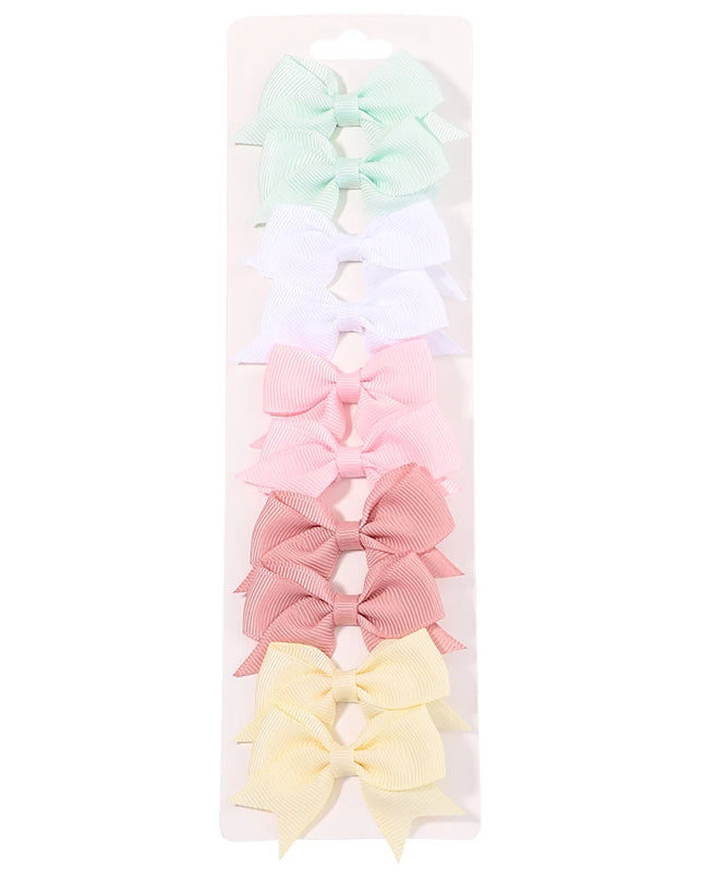 Girls’ bow hair clip set -Set de pinzas con lazo para niñas
