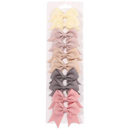 Girls’ bow hair clip set -Set de pinzas con lazo para niñas