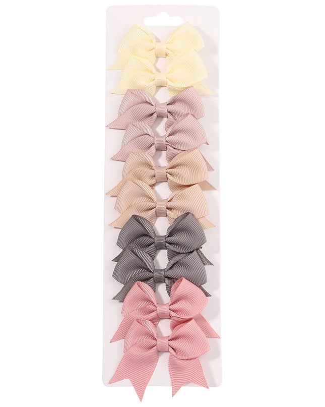 Girls’ bow hair clip set -Set de pinzas con lazo para niñas